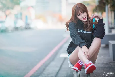 Young Woman Posing on Urban Street with Sunglasses - free wallpaper 5760×3840