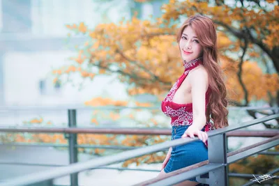 Woman in Red Top and Denim by Autumn Railing - free wallpaper 5760×3840