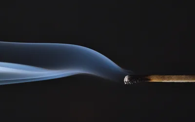 Lit Cigarette with Smoke Against Black Background - free photography wallpaper 5741×3588