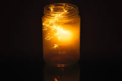Glowing Fairy Lights Inside Glass Jar in Darkness - free photography wallpaper 5817×3878