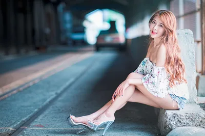 Woman in Floral Top Seated on Urban Street at Night - free people & portraits wallpaper 5760×3840