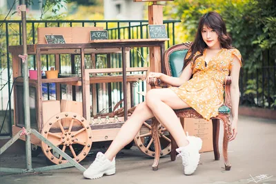 Woman in Yellow Floral Dress Posing by Vintage Cart - free people & portraits wallpaper 5760×3840