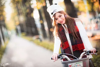 Young Woman on Bicycle in Autumn Park - free people & portraits wallpaper 5760×3840