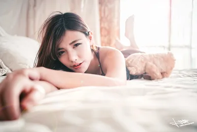 Woman Posing on Bed in Soft Natural Light - free people & portraits wallpaper 6144×4098