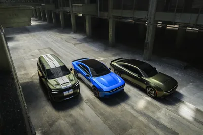 Three Modern Sports Cars Parked in Concrete Garage - free cars & vehicles wallpaper 3000×2000