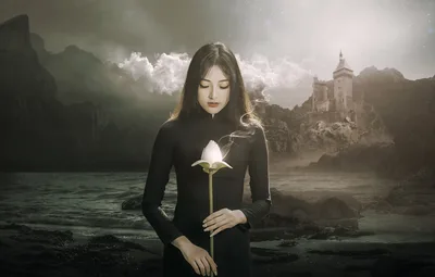 Woman in Black Dress Holding Glowing Flower by Castle - free wallpaper 3000×1912