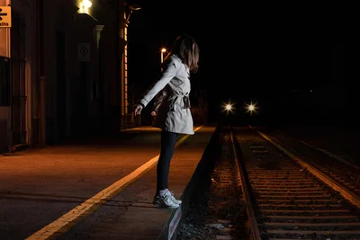 Woman Balancing on Railroad Tracks at Night - free people & portraits wallpaper 6000×4000