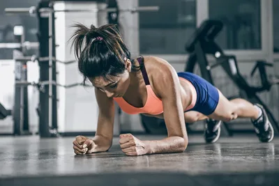 Woman Performing Plank Exercise in Modern Gym - free people & portraits wallpaper 3000×2000