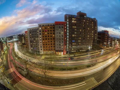 Urban Apartment Complex at Dusk with Traffic Light Trails - free city & urban wallpaper 4608×3456