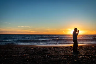 Silhouetted Person Photographing Sunset at Beach - free people & portraits wallpaper 6000×4000
