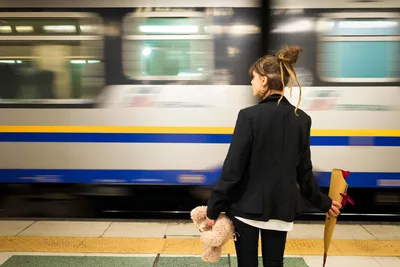 Young Woman Waiting at Train Platform with Teddy Bear - free people & portraits wallpaper 6000×4000