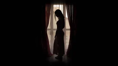 Silhouetted Figure Standing At Window With Curtains - free wallpaper 6144×3432