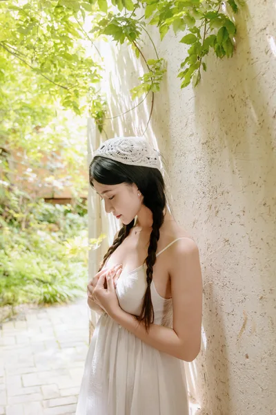 Woman in White Dress Leaning Against Stone Wall - free people & portraits wallpaper 4000×6000