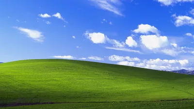 Rolling Green Hills Under Azure Sky - free nature wallpaper 3840×2160