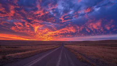 Endless Plains: Desert Road Under Burning Skies - free landscapes wallpaper 3840×2160