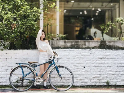 Woman in White Outfit Posing with Blue Bicycle - free people & portraits wallpaper 4096×3072