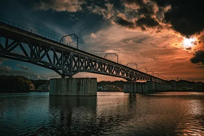 Long Bridge Over Water at Dramatic Sunset - free city & urban wallpaper 8368×5584