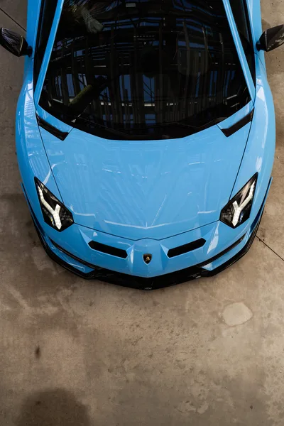 Bright Blue Lamborghini Aventador Top-Down View - free cars & vehicles wallpaper 6336×9504