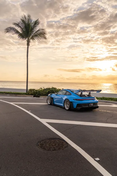 Blue Sports Car Parked by Beach at Sunset - free cars & vehicles wallpaper 6336×9504