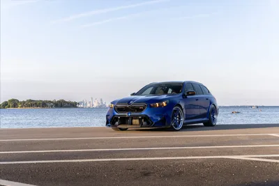Blue BMW M340i Wagon Parked on Beach Promenade - free cars & vehicles wallpaper 9504×6336