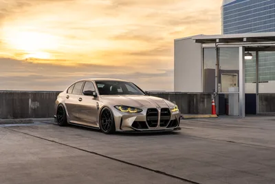 Luxury BMW M340i on Rooftop Parking at Sunset - free cars & vehicles wallpaper 9504×6336