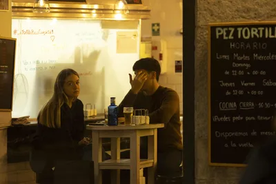 Two People at Small Table in Spanish Restaurant - free people & portraits wallpaper 6000×4000