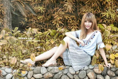Young Woman Posing Among Autumn Plants and Stones - free people & portraits wallpaper 5760×3840