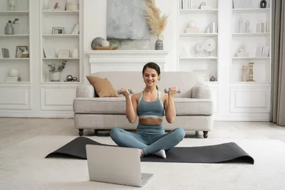 Woman Exercising at Home with Laptop and Dumbbells - free people & portraits wallpaper 7952×5304