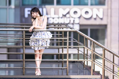 Woman in Blue Floral Dress Posing at Urban Railing - free people & portraits wallpaper 6144×4096