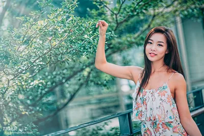 Young Woman Posing Among Green Foliage - free people & portraits wallpaper 5760×3840