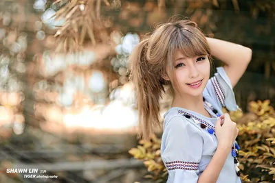 Young Woman in Light Blue Áo Dài by Traditional Architecture - free people & portraits wallpaper 5760×3840