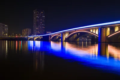 Illuminated Bridge Over Water at Night - free city & urban wallpaper 7997×5336