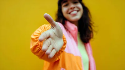 Child Reaching Out Hand Against Yellow Background - free people & portraits wallpaper 2912×1632