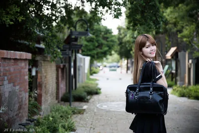 Young Woman With Black Bag On Tree-Lined Street - free people & portraits wallpaper 5760×3840
