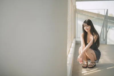 Woman in Black Dress Crouching by Bright Window - free wallpaper 6144×4096