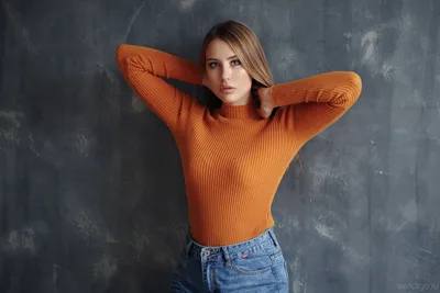 Portrait of Woman in Orange Sweater Against Gray Backdrop - free people & portraits wallpaper 5120×3414