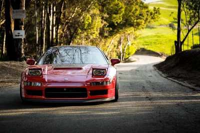 Red Sports Car On Tree-Lined Rural Road - free cars & vehicles wallpaper 5616×3744