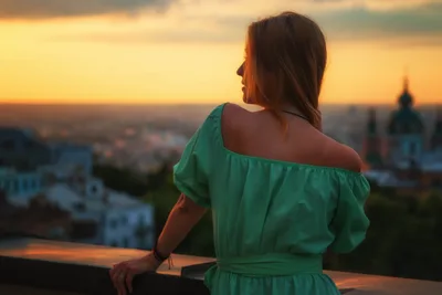 Woman in Green Dress Overlooking Sunset City - free people & portraits wallpaper 5472×3648