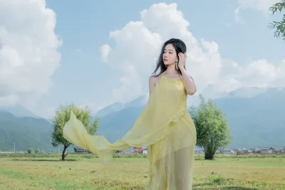 Woman in Yellow Dress in Mountain Valley Landscape - free people & portraits wallpaper 6000×4000