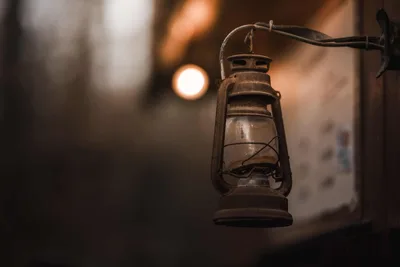 Vintage Lantern Hanging in Warm Bokeh Light - free photography wallpaper 2400×1600