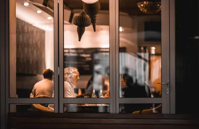 Evening Gathering Viewed Through Modern Glass Doors - free people & portraits wallpaper 2400×1556