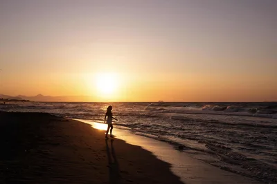 Surfer Standing in Ocean at Golden Sunset - free people & portraits wallpaper 2400×1600