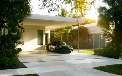 porsche,car,sports car,house,modern architecture,villa,garage,driveway,palm trees,luxury,residential,building,vehicle,automotive,sunlight,yard - free cars & vehicles wallpaper 2048×1280