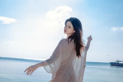 Woman in Light Shirt Posing by Calm Ocean Waters - free people & portraits wallpaper 6000×4000
