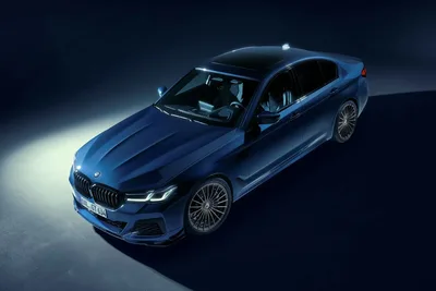 BMW Luxury Sedan in Blue Studio Lighting - free cars & vehicles wallpaper 2000×1333