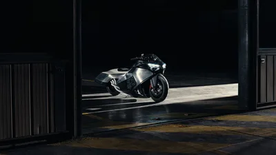 BMW Vision K18 Concept in Hangar Light - free wallpaper 5120×2880