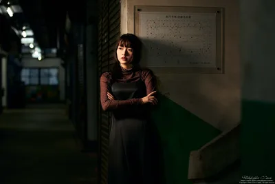 Woman Standing in Dimly Lit Corridor at Night - free people & portraits wallpaper 4901×3267