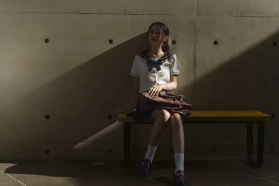 Student in School Uniform Sitting on Bench - free people & portraits wallpaper 5120×3413