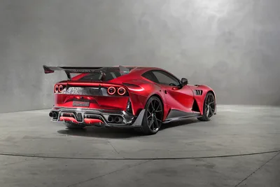 Red Sports Car With Rear Wing in Industrial Garage - free cars & vehicles wallpaper 4096×2731