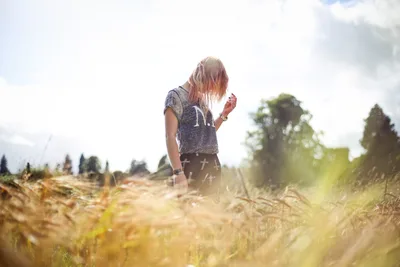 Woman Walking Through Golden Wheat Field at Sunset - free people & portraits wallpaper 5760×3840